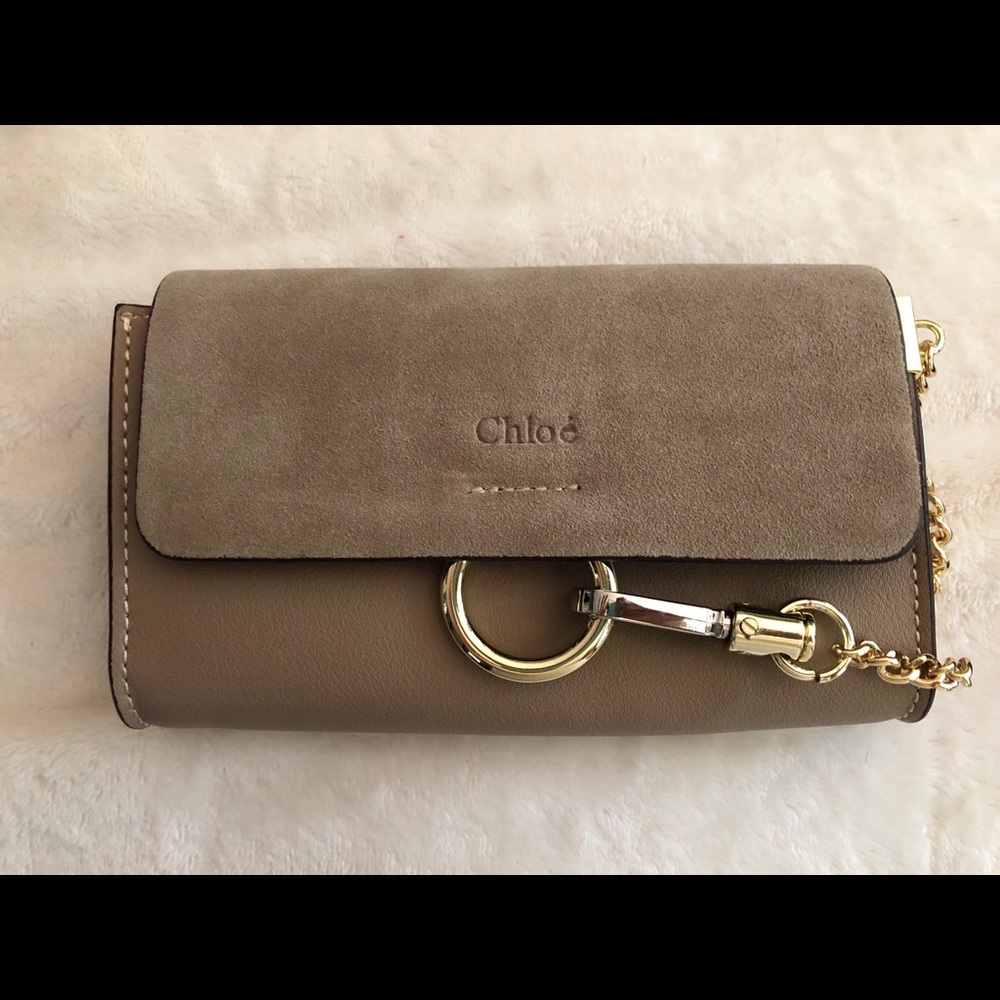Chloe clutch with shoulder strap.